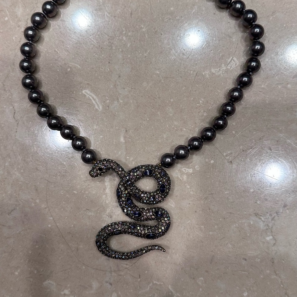 Elegant Black Beaded Necklace with Glittering Snake Pendant